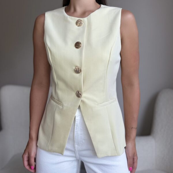 Klasikinė liemenė išskirtinėmis sagomis Geltona pastelinė spalva