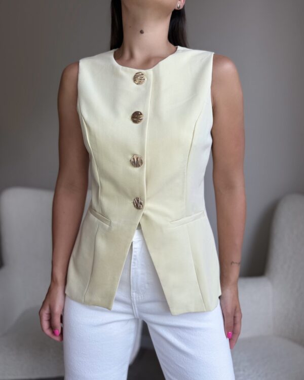 Klasikinė liemenė išskirtinėmis sagomis Geltona pastelinė spalva