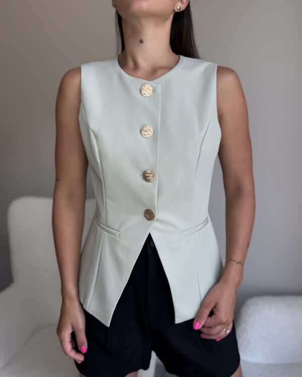 Klasikinė liemenė išskirtinėmis sagomis Žalia pastelinė spalva