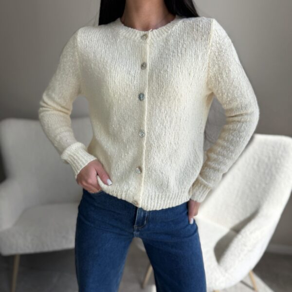 Susagstomas beige megztinis su vilna