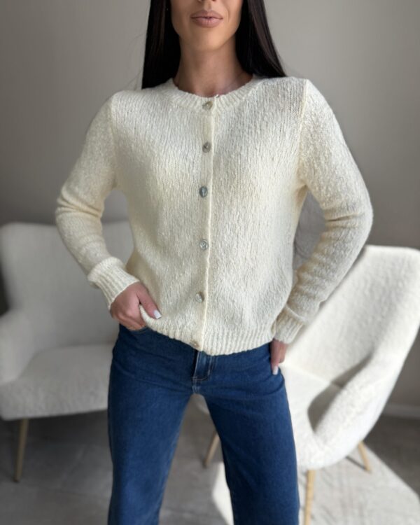 Susagstomas beige megztinis su vilna