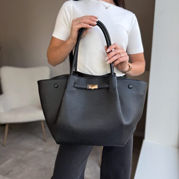 Talpi juoda rankinė su magnetais