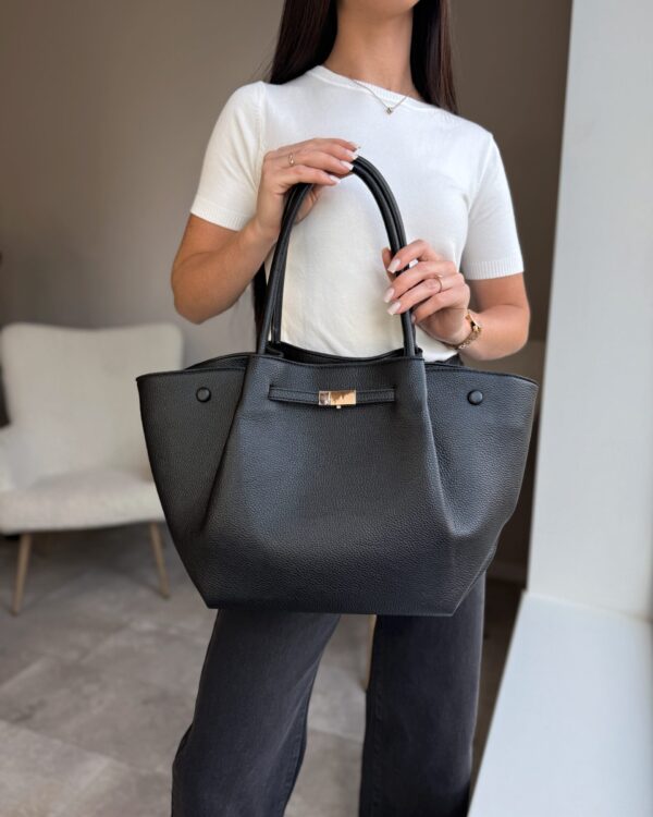 Talpi juoda rankinė su magnetais