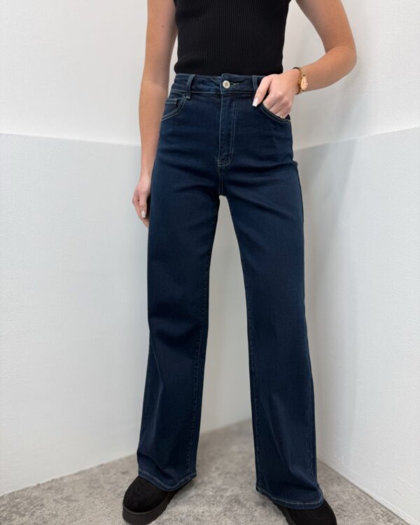 Mėlyni tamprūs džinsai aukštas liemuo Dad fit